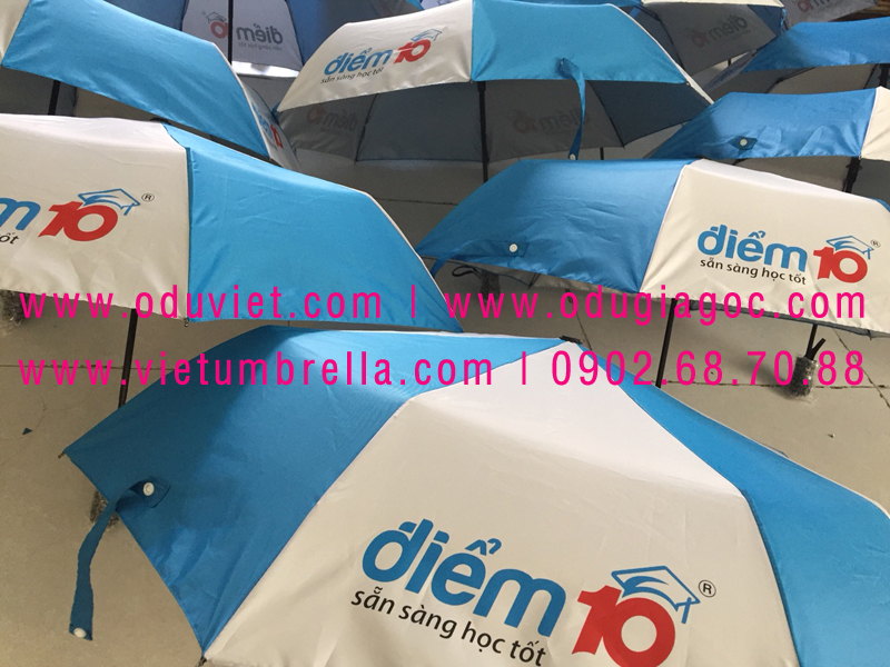 xưởng sản xuất ô dù cầm tay in logo quảng cáo